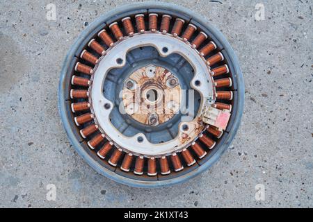 Details disassembled electric motor washing machine close up isolated on white Stock Photo