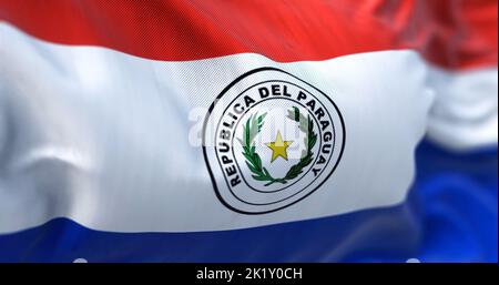 Close-up view of the Paraguay national flag waving in the wind. Republic of Paraguay is a landlocked country in South America. Fabric textured backgro Stock Photo