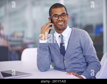 Communication for the modern soul. a young businessman talking on his cellphone. Stock Photo