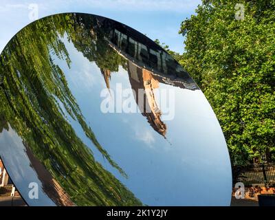 Albert Hall tower reflected in the Sky Mirror a sculpture by artist Anish Kapoor in Nottingham Nottinghamshire England Stock Photo