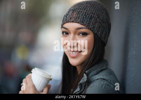 Shes an urban woman. an attractive young woman out in the town. Stock Photo