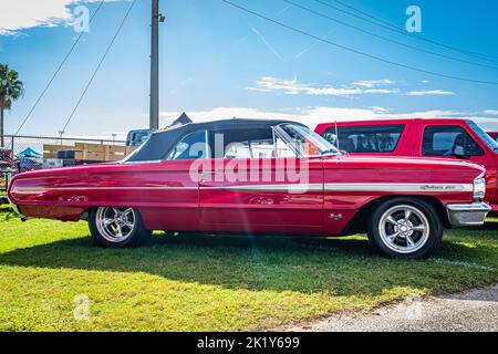 Daytona Beach, FL - November 28, 2020: Low perspective side view of a 1964 Ford Galaxie 500 Convertible at a local car show. Stock Photo