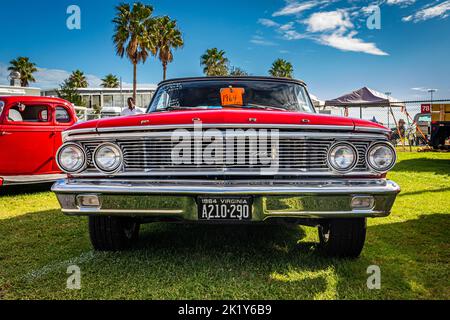 Daytona Beach, FL - November 28, 2020: Low perspective front view of a 1964 Ford Galaxie 500 Convertible at a local car show. Stock Photo