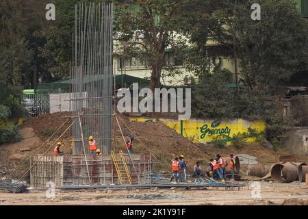 Man At Work of Construction, Metro work of Pune. Maharashtra, India. Stock Photo