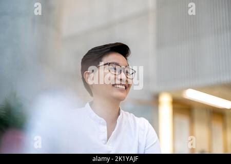 Portrait of a smiling young man in the office Stock Photo