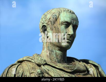 the statue of Julius Caesar in front of the Porta Palatina which was the Porta Principalis Dextera of Augusta Taurinorum, or the Roman civitas now kno Stock Photo