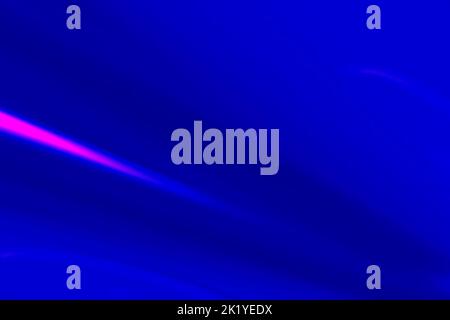 Bright pink neon rays and glowing lines.Abstract pink light trail on blue background. Stock Photo
