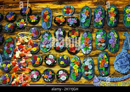 SIRINCE, Izmir, Turkey - January 16, 2022. Various Turkish traditional souvenirs in street shops. Stock Photo