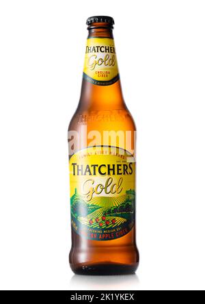 LONDON, UK - JULY 05, 2022: Thatchers Gold apple cider in glass bottle on white. Stock Photo