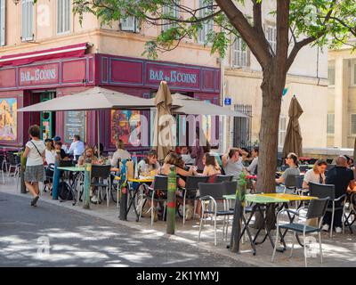 Marseille, France - May 15th 2022: Busy restaurant terrace in the old town Stock Photo
