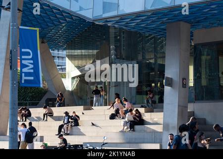 The newly named TMU, Toronto Metropolitan University (formally Ryerson University) entrance on Yonge St.  with students on the stairs. Stock Photo