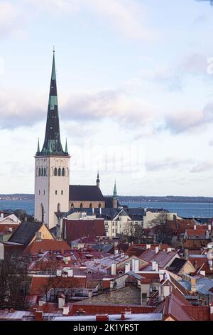 Tallinn, Estonia -  January 4, 2020: panoramic view of the city with medieval towers and walls, and St. Olav's Church in the middle99 Stock Photo