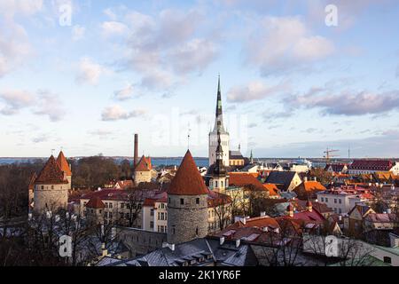 Tallinn, Estonia -  January 4, 2020: panoramic view of the skyline of Tallinn with medieval towers and walls, and St. Olav's Church in the middle9 Stock Photo