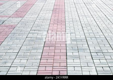 Sidewalk white, gray, red tiles. Architecture, construction. Abstract curly background.. Stock Photo