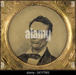 Campaign button for Abraham Lincoln, 1860. Portrait appears in tintype. Reverse side of button is a tintype of running mate Hannibal Hamlin. One of the earliest examples of photographic images on political buttons. Date1860 Stock Photo