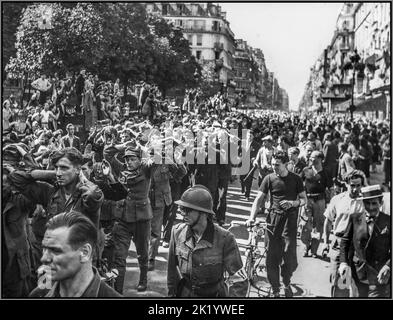 PARIS LIBERATION NAZI GERMANY PRISONERS SURRENDERS Hands on heads former Nazi occupiers WWII: Europe: France; 'German POWs - Paris sees the Germans go' to the goading and relief of the Parisian residents. Date circa 25 August 1944 Stock Photo