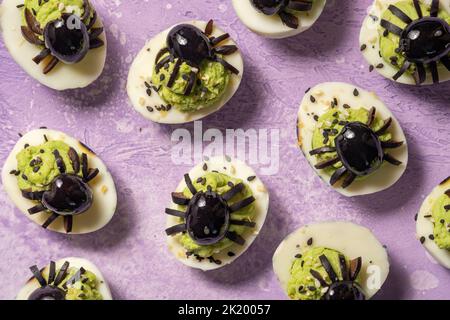 Deviled eggs with a Spider for Halloween Stock Photo