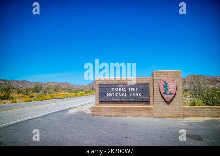 An entrance road going to Joshua Tree National Park Stock Photo