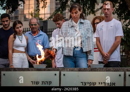 Tel Aviv, Israel. 21st Sep, 2022. Relatives and family member of victims of the 1972 Olympic attacks take part in a wreath-laying ceremony held to mark the 50th anniversary of the attacks on the Israeli Olympic team during the 1972 Summer Olympics in Munich. Credit: Ilia Yefimovich/dpa/Alamy Live News Stock Photo