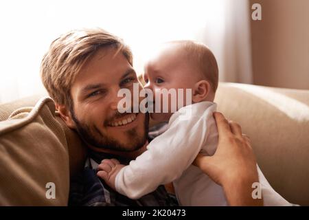 Daddys little angel. an affectionate father and his baby boy. Stock Photo