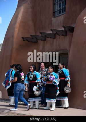 Native American members of the Zuni Olla Maidens from the Zuni Pueblo near Gallup, New Mexico, prepare to perform in Santa Fe, New Mexico. Stock Photo