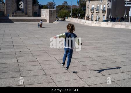 A little boy playing at the National Flag Memorial, Rosario, Argentina Stock Photo