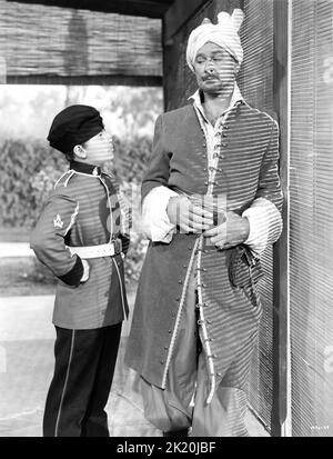 DEAN STOCKWELL and ERROL FLYNN in KIM 1950 director VICTOR SAVILLE novel Rudyard Kipling costume design Valles Metro Goldwyn Mayer Stock Photo