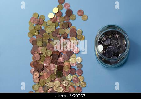 Elderly woman counting coins on table. Close up macro detail of romanian lei banknotes Stock Photo