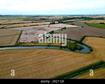An aerial shot of a scenic countryside with a river in Kent, UK Stock Photo