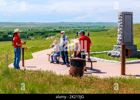 Native American Indian tourguide and visitors; Little Bighorn Battlefield National Monument; Montana; USA Stock Photo