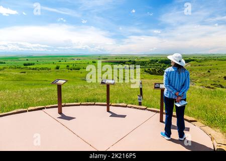 Female tourist; Sharpshooter's Ridge; Little Bighorn Battlefield National Monument; Montana; USA Stock Photo