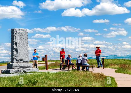 Native American Indian tourguide and visitors; Little Bighorn Battlefield National Monument; Montana; USA Stock Photo