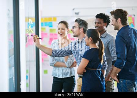 Theyre positive about his ideas. a business meeting on the go. Stock Photo