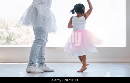 Dance and love with father and daughter family together in a princess dress for support, childhood and happiness. Care, fun and lifestyle with dad Stock Photo