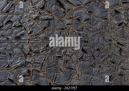 old black cracked paint weathered texture background Stock Photo
