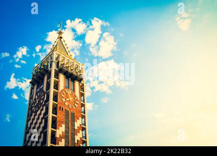 BATUMI, GEORGIA - 4th august, 2022: Clock Tower on Piazza Square with narrow old town street. Famous sightseeing attraction Adjara region of Georgia Stock Photo