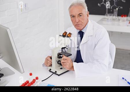 Ready to make a new discovery. a mature scientist working in a lab. Stock Photo
