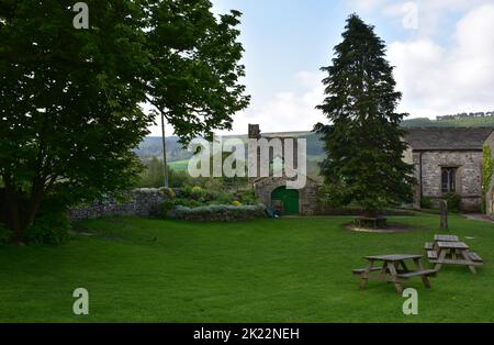 Picnic area outside in Marrick Priory in the English countryside in the spring. Stock Photo