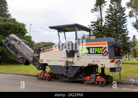 Asphalt road milling cold planing machine parked in Avalon Beach,Sydney,NSW,Australia owned by ozpave Stock Photo