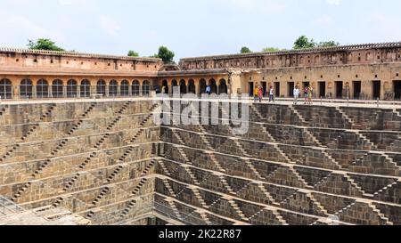 INDIA, RAJASTHAN, DAUSA, July 2022, Tourist at Chand Baori or Abhaneri Stepwell constructed during the 8th-9th Century, Abhaneri Stock Photo