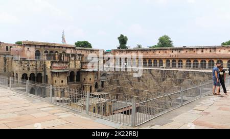 INDIA, RAJASTHAN, DAUSA, July 2022, Tourist at Chand Baori Stepwell constructed during the 8th-9th Century, Abhaneri Stock Photo