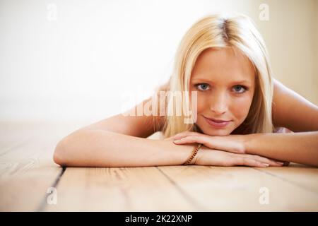 Beautiful and homely. a gorgeous young woman relaxing at home Stock