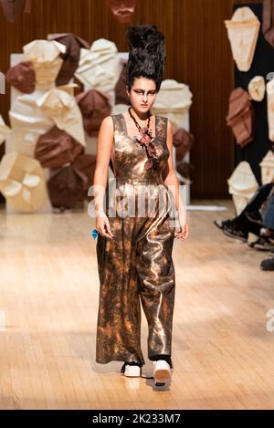 Model Madeleine Mills, modelling on catwalk for VIN+OMI 'Opinions' show for London Fashion Week 2022. Recycled materials. Sustainable fashion. Stock Photo