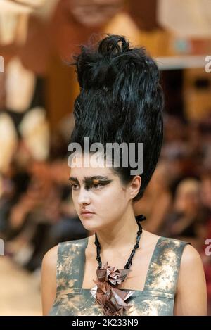 Model Madeleine Mills, modelling on catwalk for VIN+OMI 'Opinions' show for London Fashion Week 2022. Recycled materials. Sustainable fashion. Stock Photo