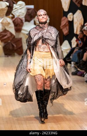 Model Dieter Rose, modelling on catwalk for VIN+OMI 'Opinions' show for London Fashion Week 2022. Recycled materials. Sustainable fashion. Stock Photo