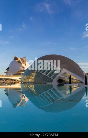 Hemisfèric,a digital 3D cinema & planetarium with Palau de les Arts Reina Sofía behind at City of Arts and Sciences in Valencia Spain at dawn in Sept Stock Photo