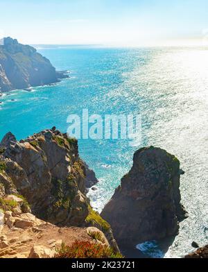 Cabo da Roca sunshine landscape, shimmering Atlantic ocean, Portugal Stock Photo