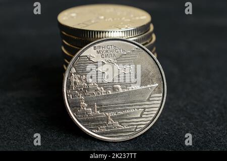 Ukrainian coins - war period limited edition 2022. Translation - loyalty, courage, strength. Stock Photo