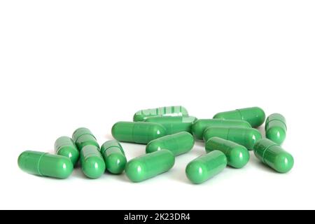 Green pills. Capsule pile isolated, drugs set, pill collection, medicine capsules group on white background Stock Photo