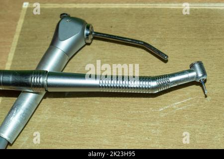 Dentists Use · Mouth Mirror · Dental Probe · Tooth Scaler · Forceps · Suction Device or Saliva Ejector · Dental Compressor. Stock Photo